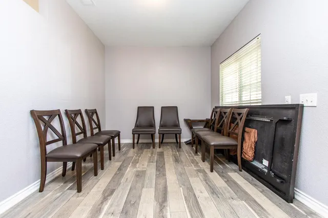 a kitchen with stainless steel appliances granite countertop a stove and a refrigerator