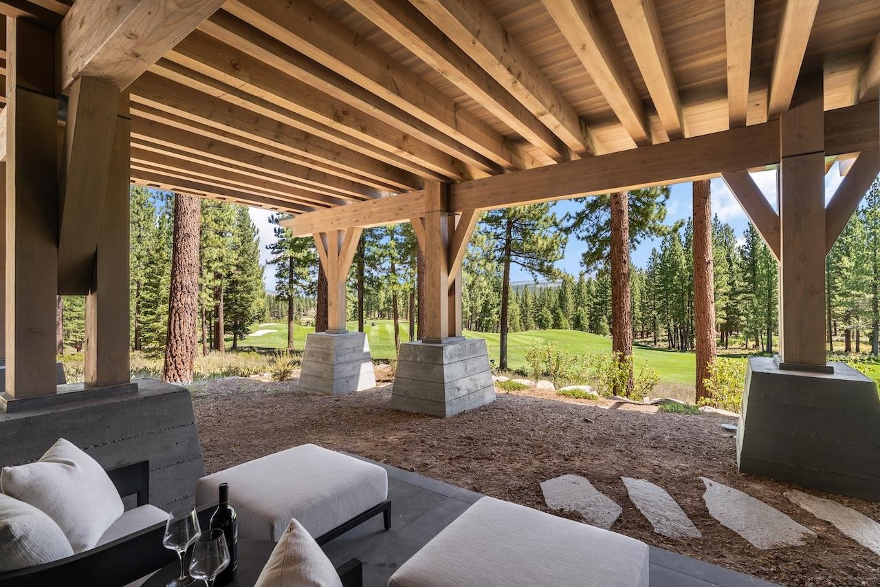 7745 Lahontan Drive Truckee, CA 96161 - Photo 24 of 28 a room with furniture and a floor to ceiling window