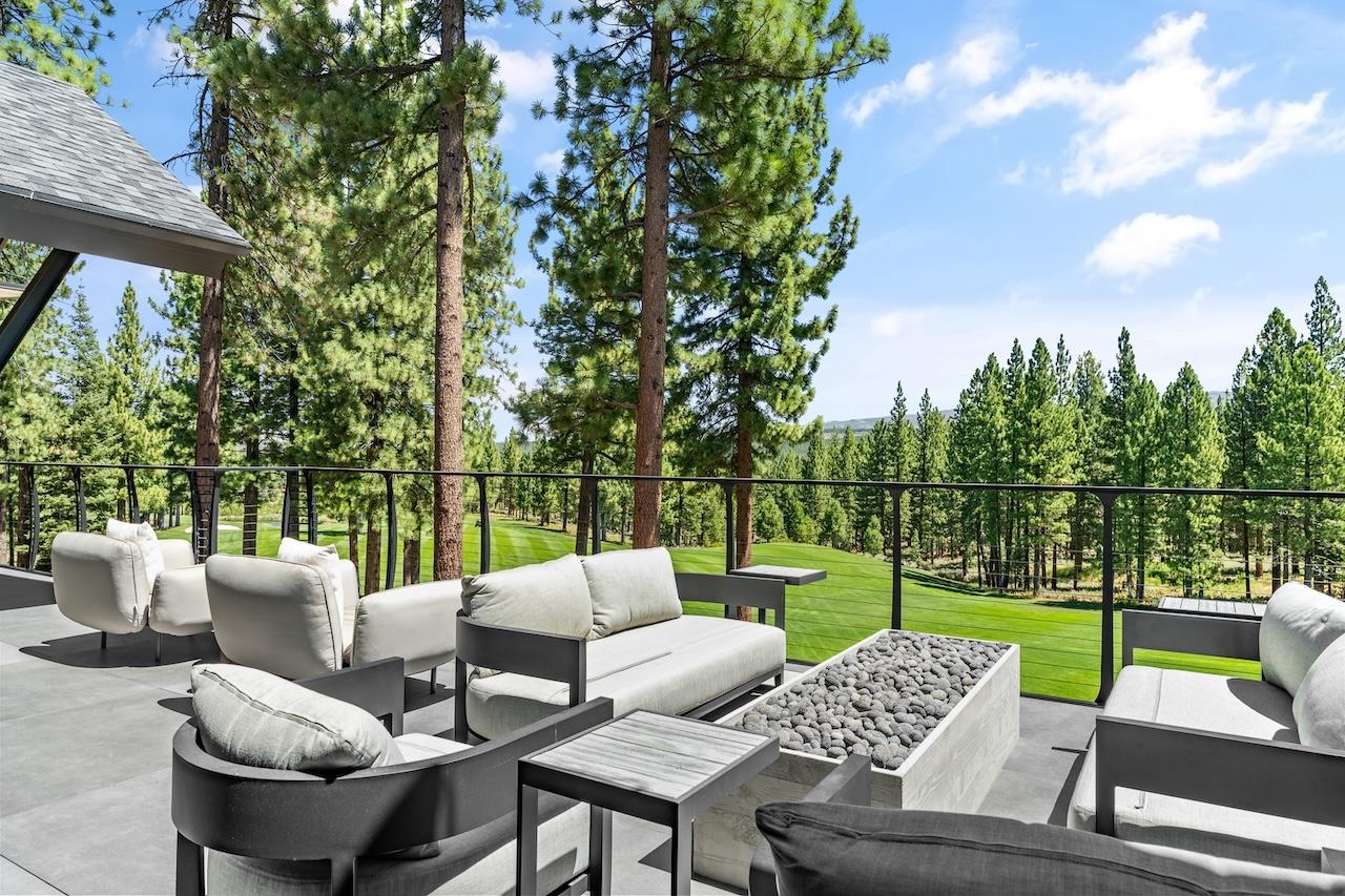7745 Lahontan Drive Truckee, CA 96161 - Photo 3 of 28 a view of a patio with couches chairs and a big yard