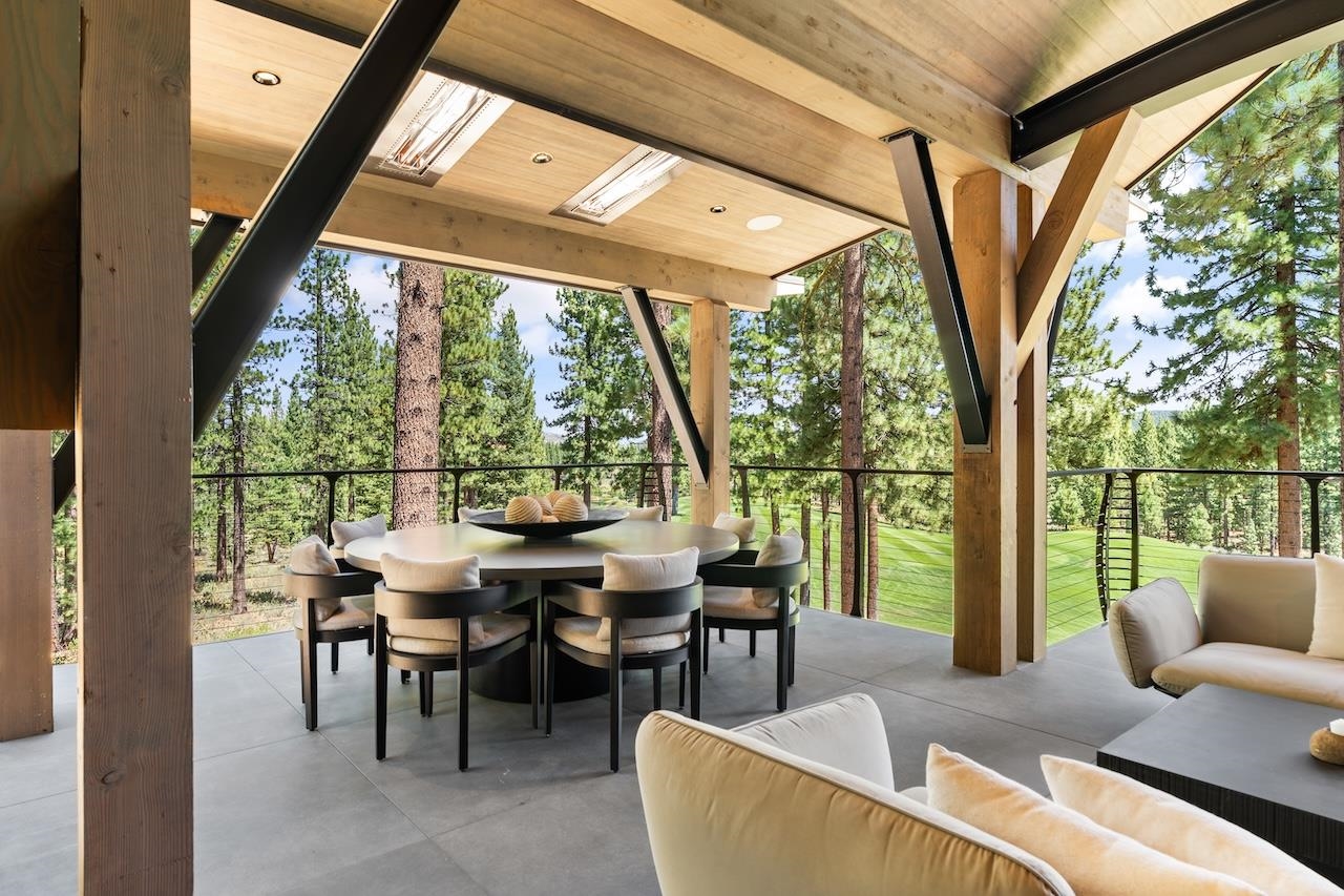 7745 Lahontan Drive Truckee, CA 96161 - Photo 7 of 28 a living room with patio furniture and large windows