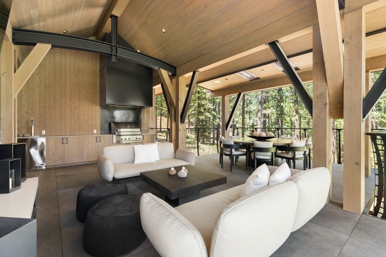 7745 Lahontan Drive Truckee, CA 96161 - Photo 8 of 28 a living room with furniture and a large window