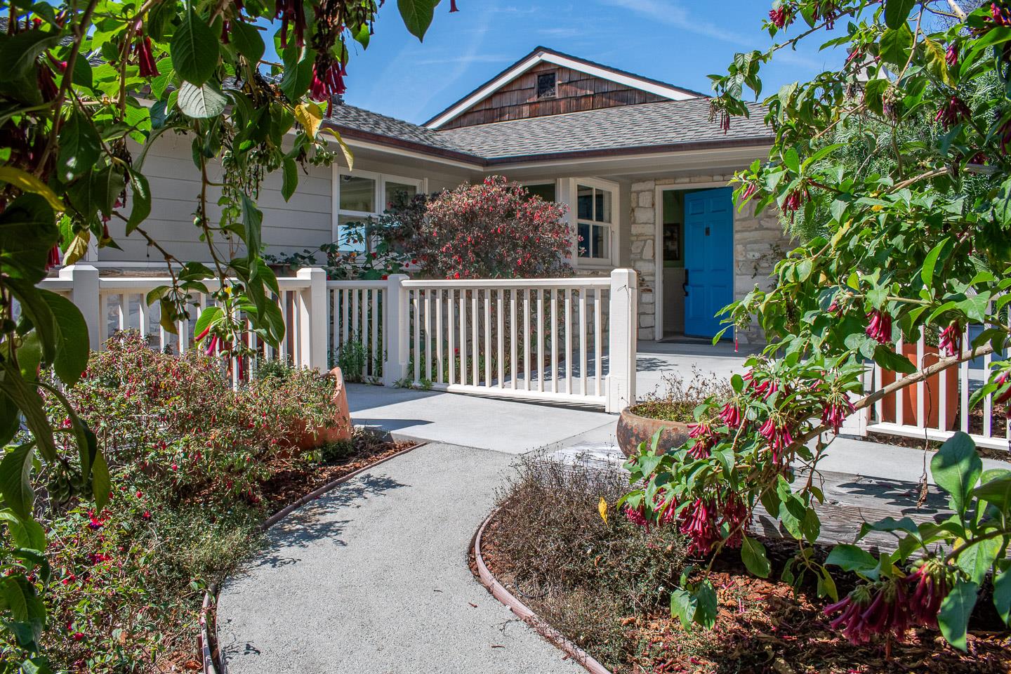 28 Cresta Way La Selva Beach, CA 95076 - Photo 2 of 39 a front view of a house with a garden