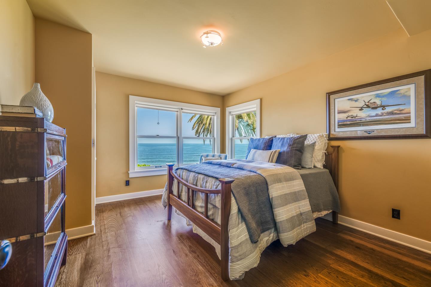 28 Cresta Way La Selva Beach, CA 95076 - Photo 23 of 39 a bed sitting in a bedroom next to a window