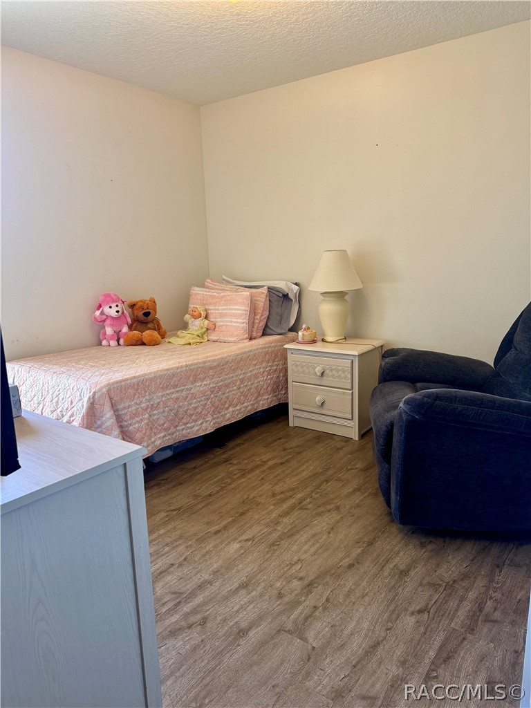 4588 East Van Ness Road Inverness, FL 34453 - Photo 24 of 34 a bedroom with a bed and window