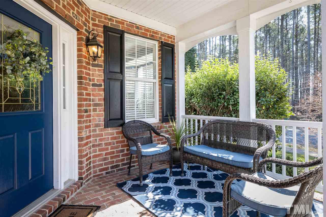 8600 Churchdown Court Raleigh, NC 27613 - Photo 2 of 29 a living room with furniture and a window