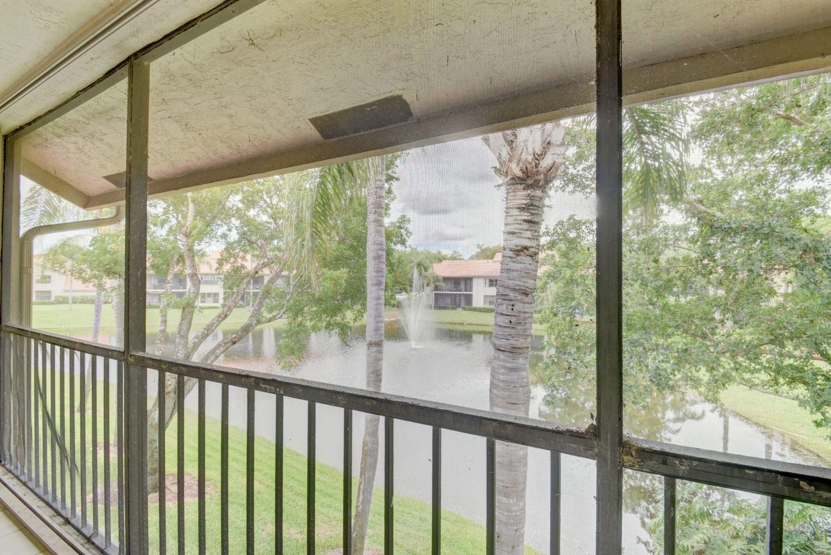 5581 Coach House Circle, Unit G Boca Raton, FL 33486 - Photo 23 of 24 LAKE & FOUNTAIN