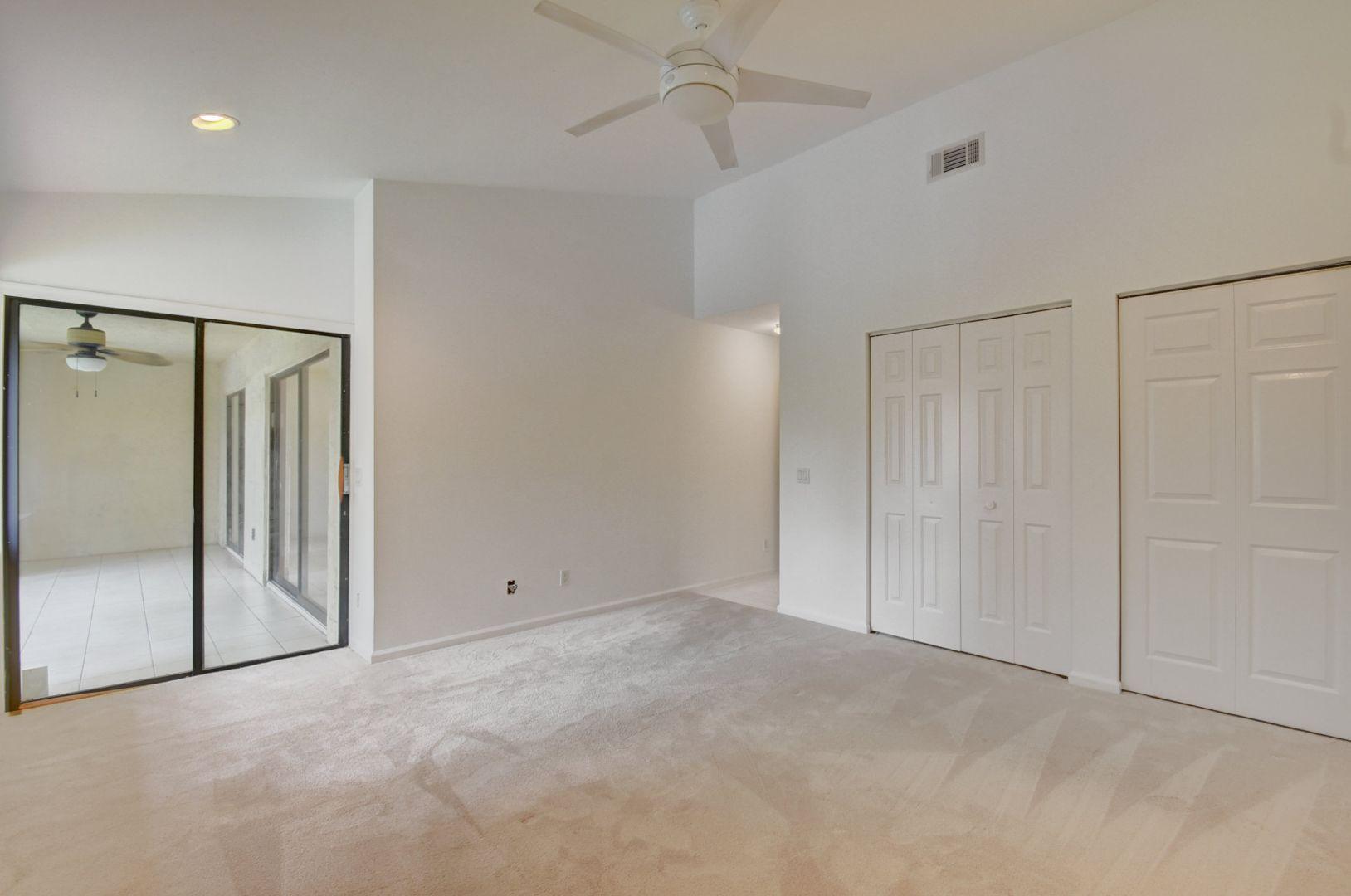 5581 Coach House Circle, Unit G Boca Raton, FL 33486 - Photo 8 of 24 MASTER BEDROOM
