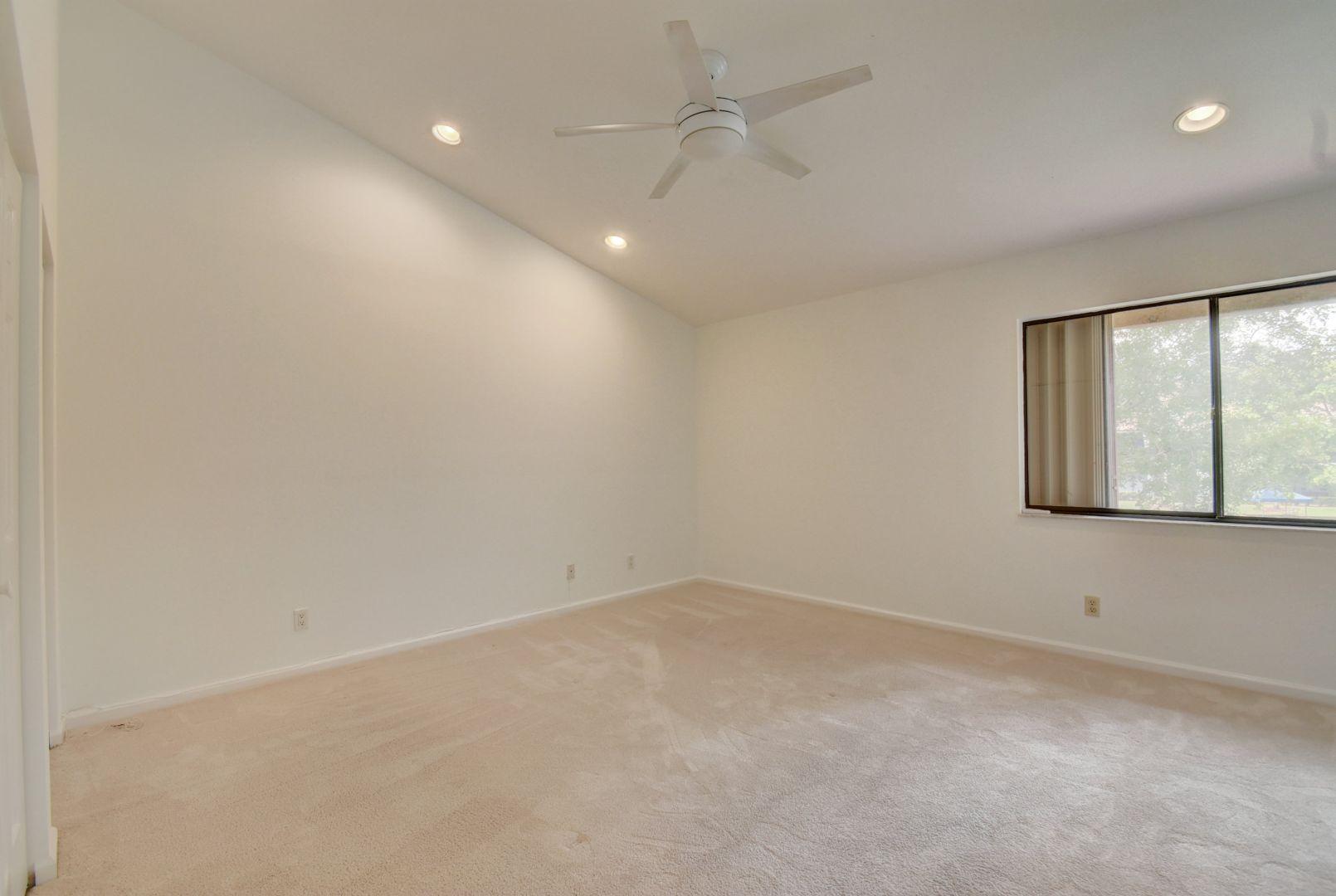 5581 Coach House Circle, Unit G Boca Raton, FL 33486 - Photo 9 of 24 MASTER BEDROOM