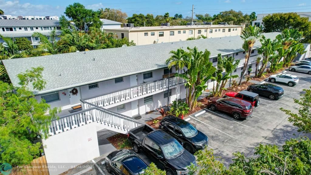 2741 Northeast 8th Avenue, Unit 15 Wilton Manors, FL 33334 - Photo 31 of 46 an aerial view of a house with a yard