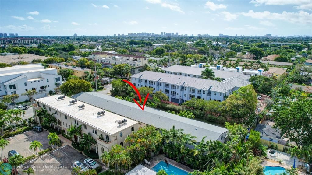 2741 Northeast 8th Avenue, Unit 15 Wilton Manors, FL 33334 - Photo 39 of 46 an aerial view of a house with a garden