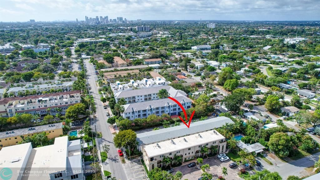 2741 Northeast 8th Avenue, Unit 15 Wilton Manors, FL 33334 - Photo 42 of 46 an aerial view of a city