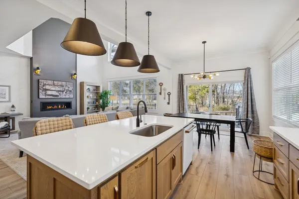 a stove top oven sitting inside of a kitchen