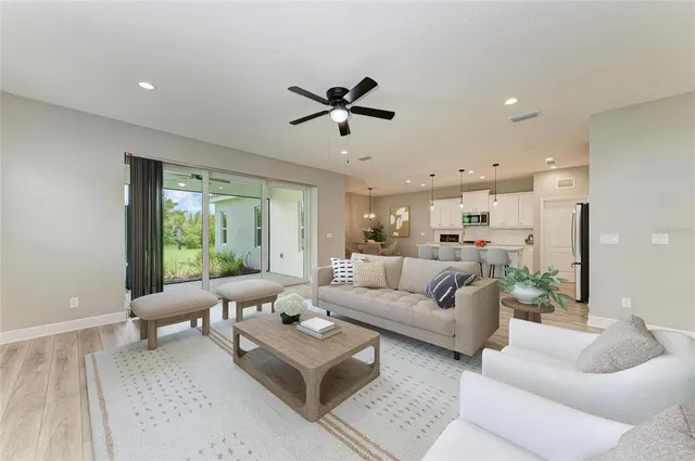 a living room with furniture and a table