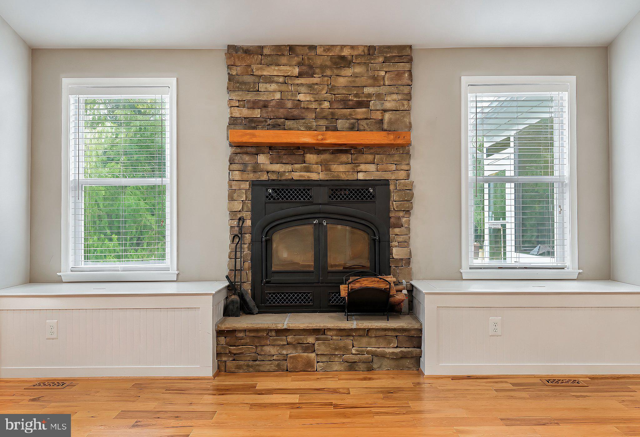 18532 Cherryfield Road Drayden, MD 20630 - Photo 8 of 58 Gorgeous wood burning Fireplace with stone facade
