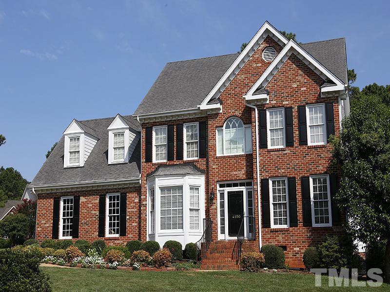 4100 Heathgate Lane Raleigh, NC 27613 - Photo 1 of 25 front view of a house with a yard