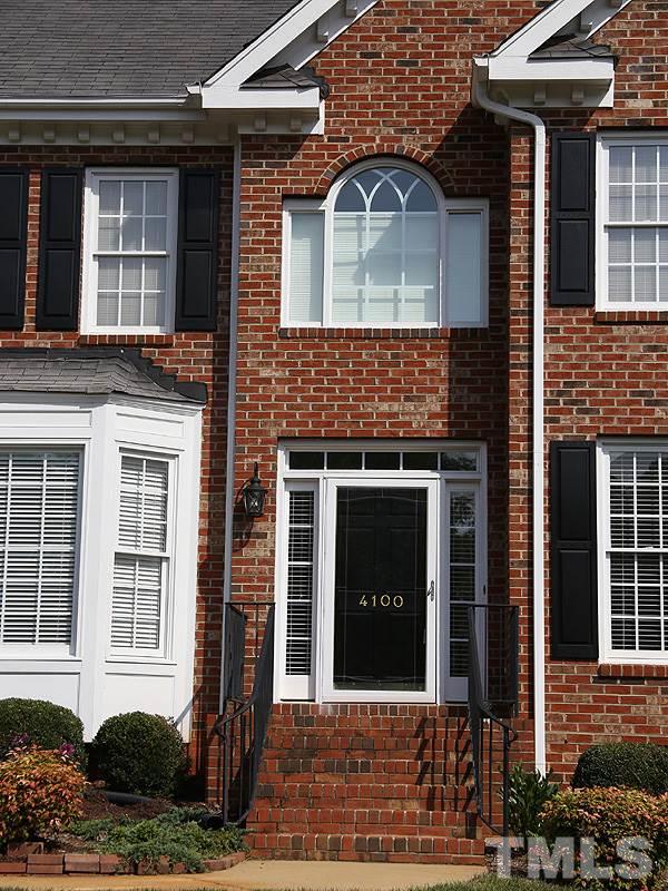4100 Heathgate Lane Raleigh, NC 27613 - Photo 2 of 25 a front view of a house with a yard