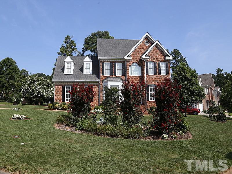 4100 Heathgate Lane Raleigh, NC 27613 - Photo 3 of 25 a front view of a house with a yard