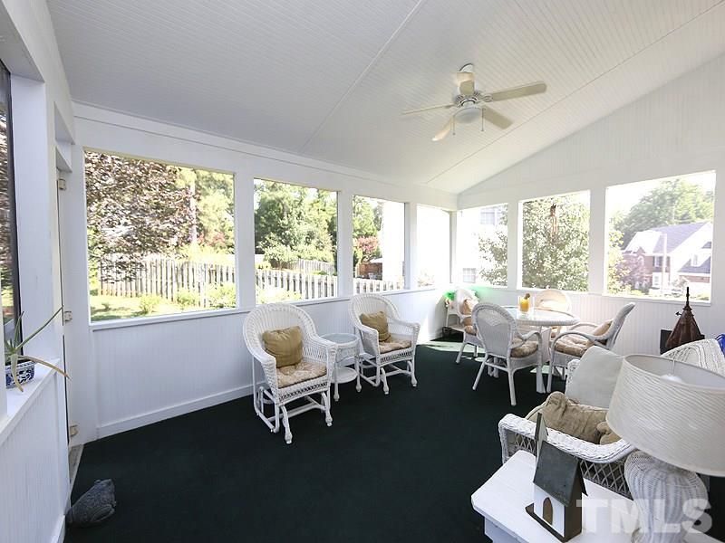 4100 Heathgate Lane Raleigh, NC 27613 - Photo 23 of 25 a living room with furniture and a large window