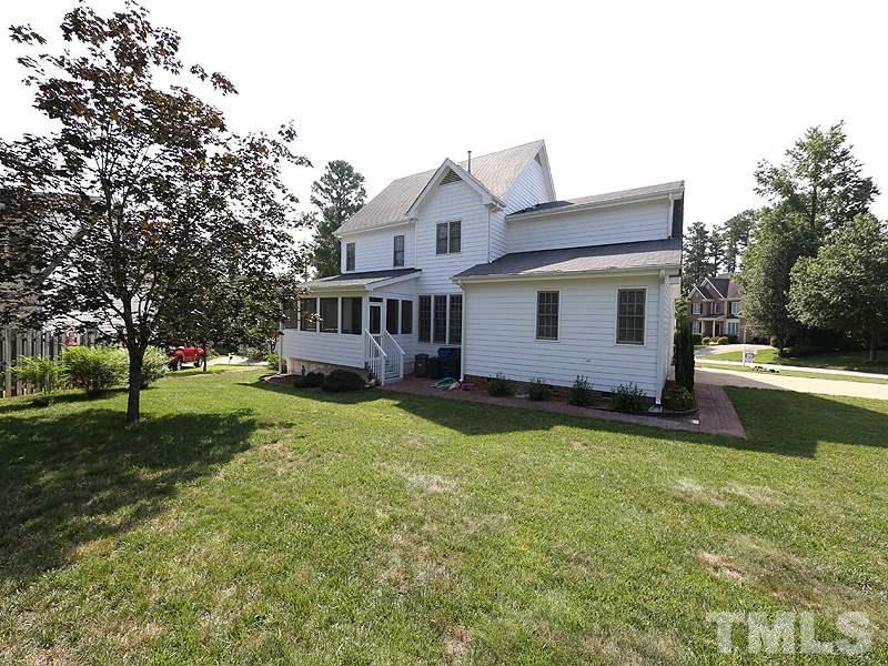 4100 Heathgate Lane Raleigh, NC 27613 - Photo 24 of 25 a view of a house with a backyard