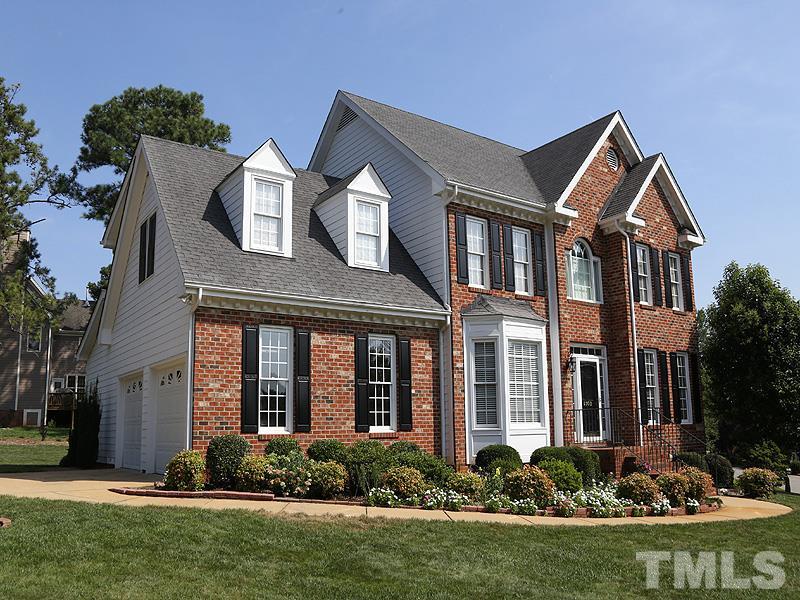 4100 Heathgate Lane Raleigh, NC 27613 - Photo 4 of 25 front view of house with a yard