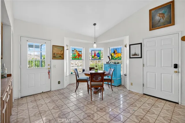 a view of a dining room with furniture