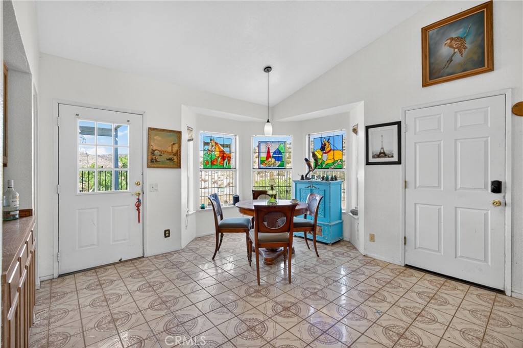 34215 Simla Street Acton, CA 93510 - Photo 11 of 37 a view of a dining room with furniture