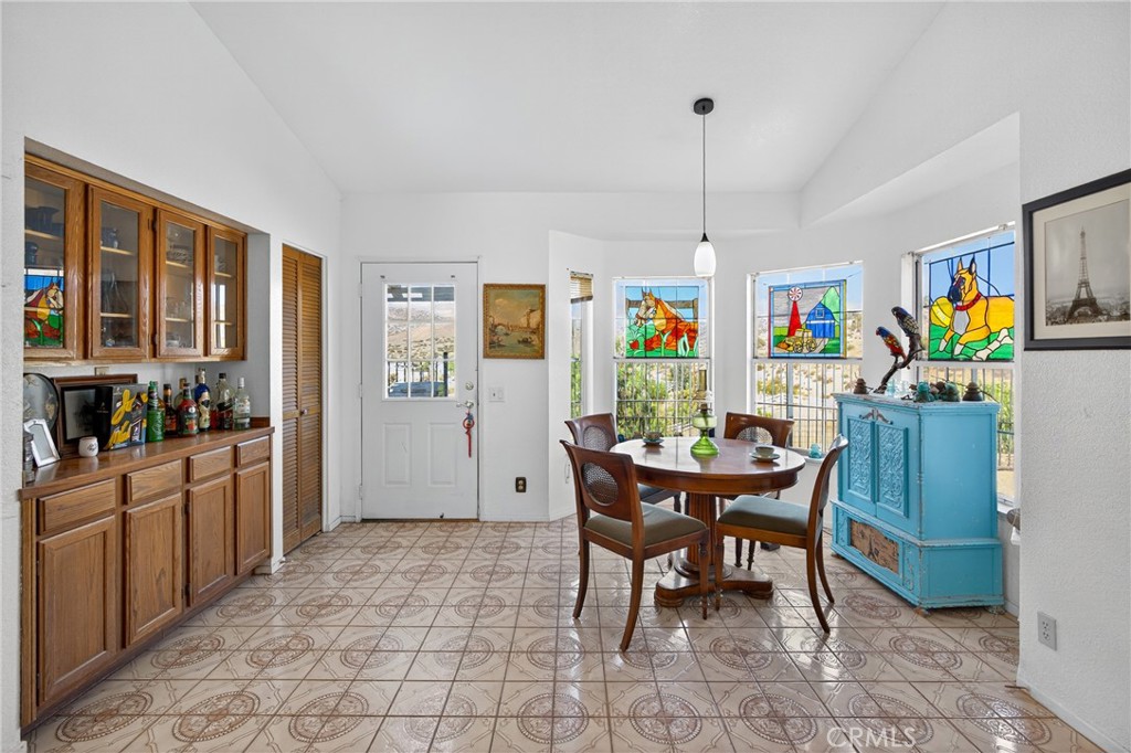 34215 Simla Street Acton, CA 93510 - Photo 12 of 37 a view of a dining room with furniture