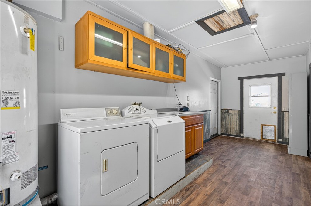 34215 Simla Street Acton, CA 93510 - Photo 16 of 37 a utility room with dryer and washer