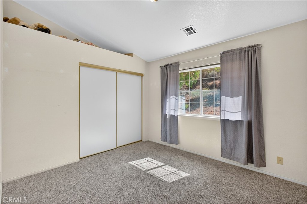 34215 Simla Street Acton, CA 93510 - Photo 23 of 37 an empty room with windows