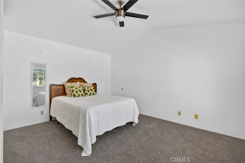 34215 Simla Street Acton, CA 93510 - Photo 26 of 37 a bedroom with a bed and window