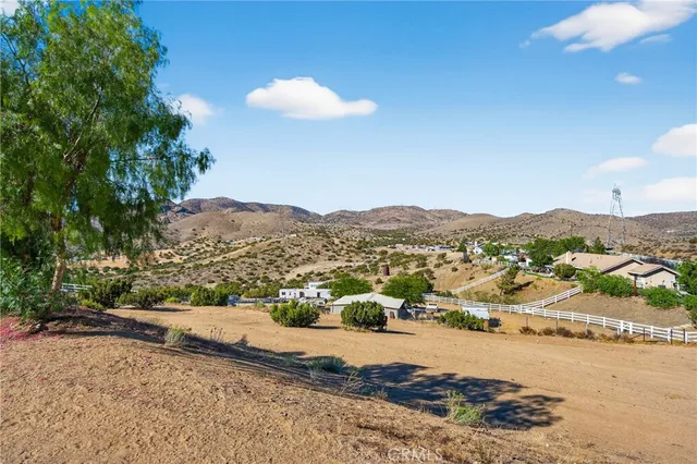 a view of a city with mountains in the background