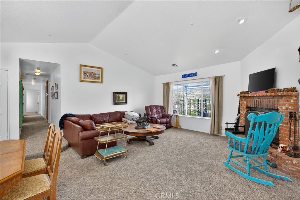 34215 Simla Street Acton, CA 93510 - Photo 9 of 37 a living room with furniture and a flat screen tv
