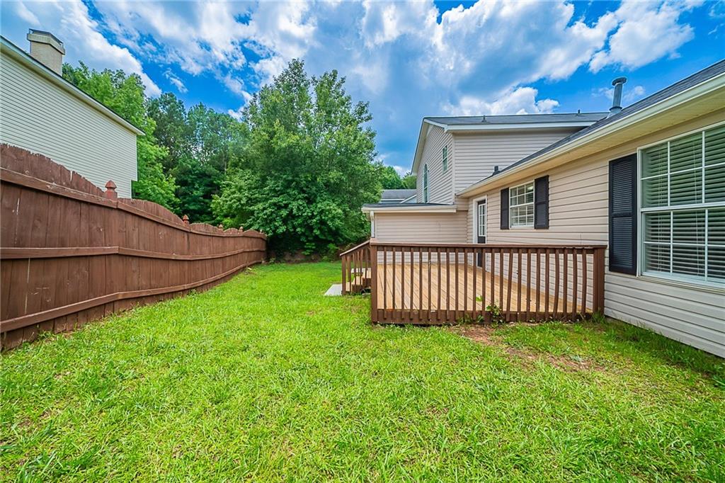 2183 Ramblewood Circle Decatur, GA 30035 - Photo 29 of 37 a view of a house with a yard and deck