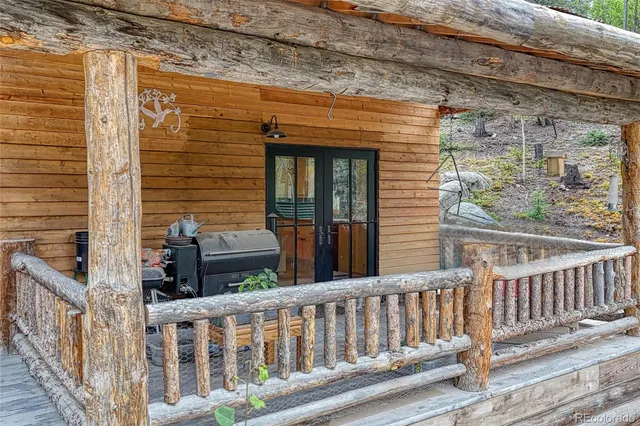 a view of a porch with a bench