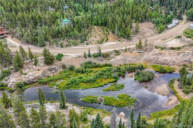 a view of a garden with a fountain