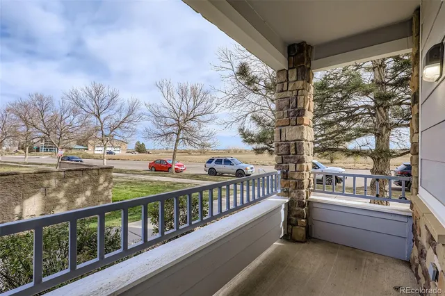 a view of balcony with furniture