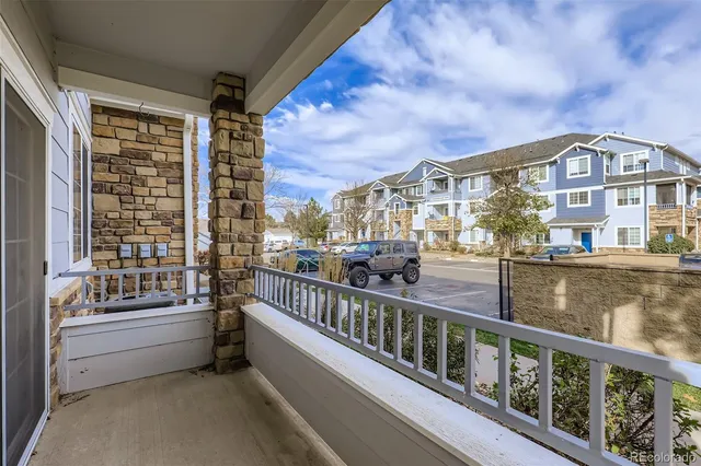 a view of a balcony with city view