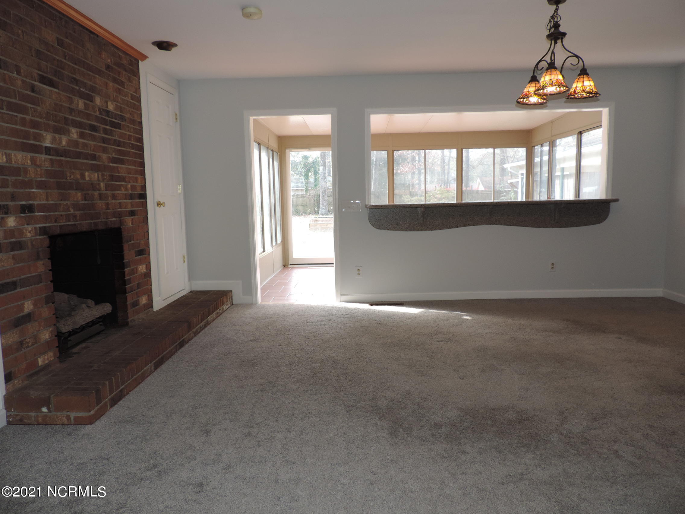 3613 Fox Chase Road New Bern, NC 28562 - Photo 15 of 34 dining room into Carolina Room
