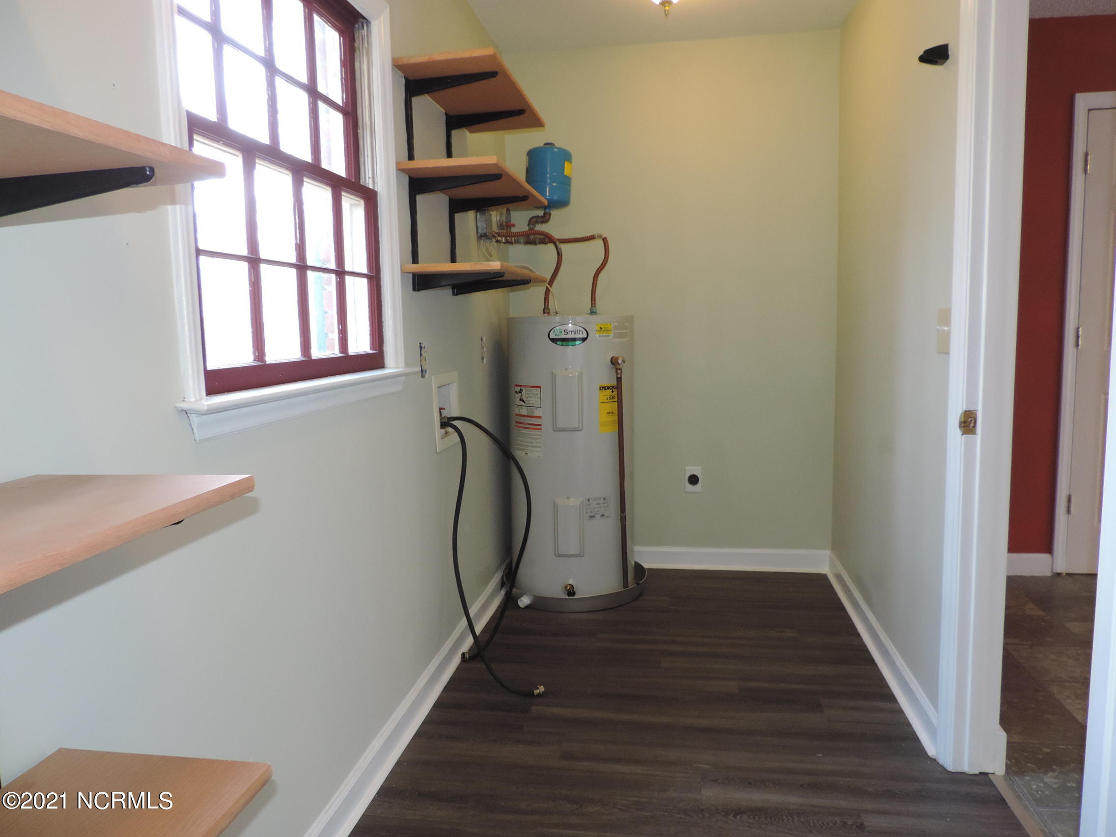 3613 Fox Chase Road New Bern, NC 28562 - Photo 8 of 34 laundry room w/shelving