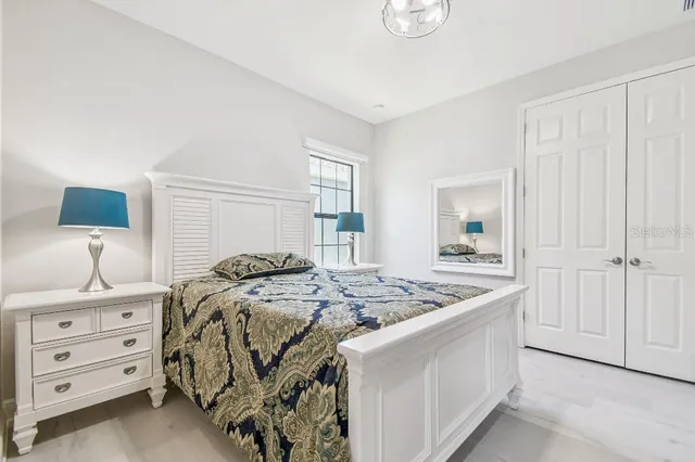 a kitchen with stainless steel appliances granite countertop white cabinets stove and granite counter top