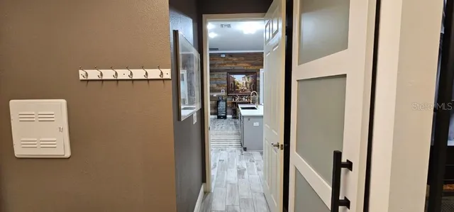 a view of kitchen with dining table and chairs