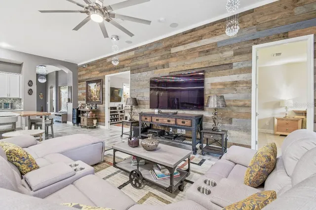 a spacious bedroom with a bed and a window