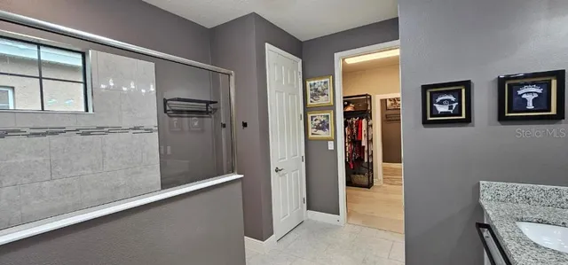 an aerial view of a house with a garden