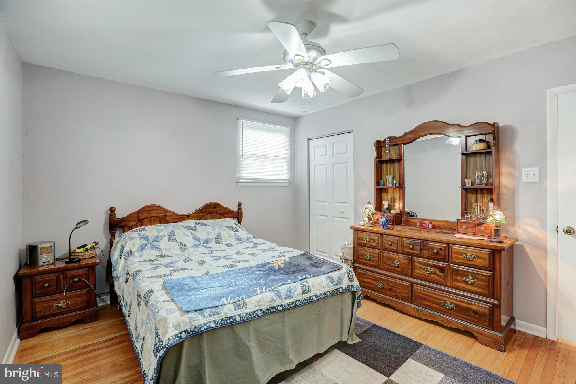 4 Old Forge Road Pennsville, NJ 08070 - Photo 14 of 61 a bedroom with a bed and a dresser in it
