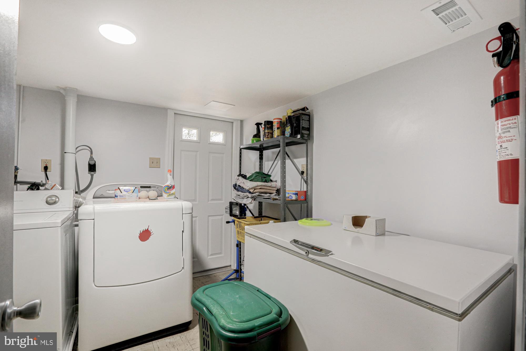 4 Old Forge Road Pennsville, NJ 08070 - Photo 21 of 61 a storage room with a washer and dryer