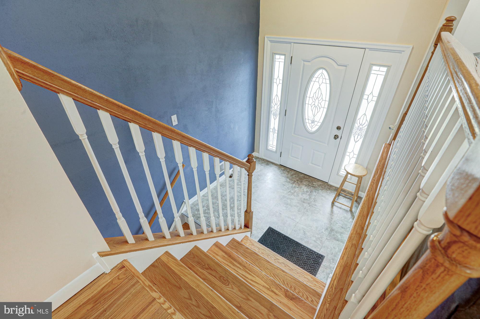 4 Old Forge Road Pennsville, NJ 08070 - Photo 29 of 61 a view of a hallway with wooden floor and stairs