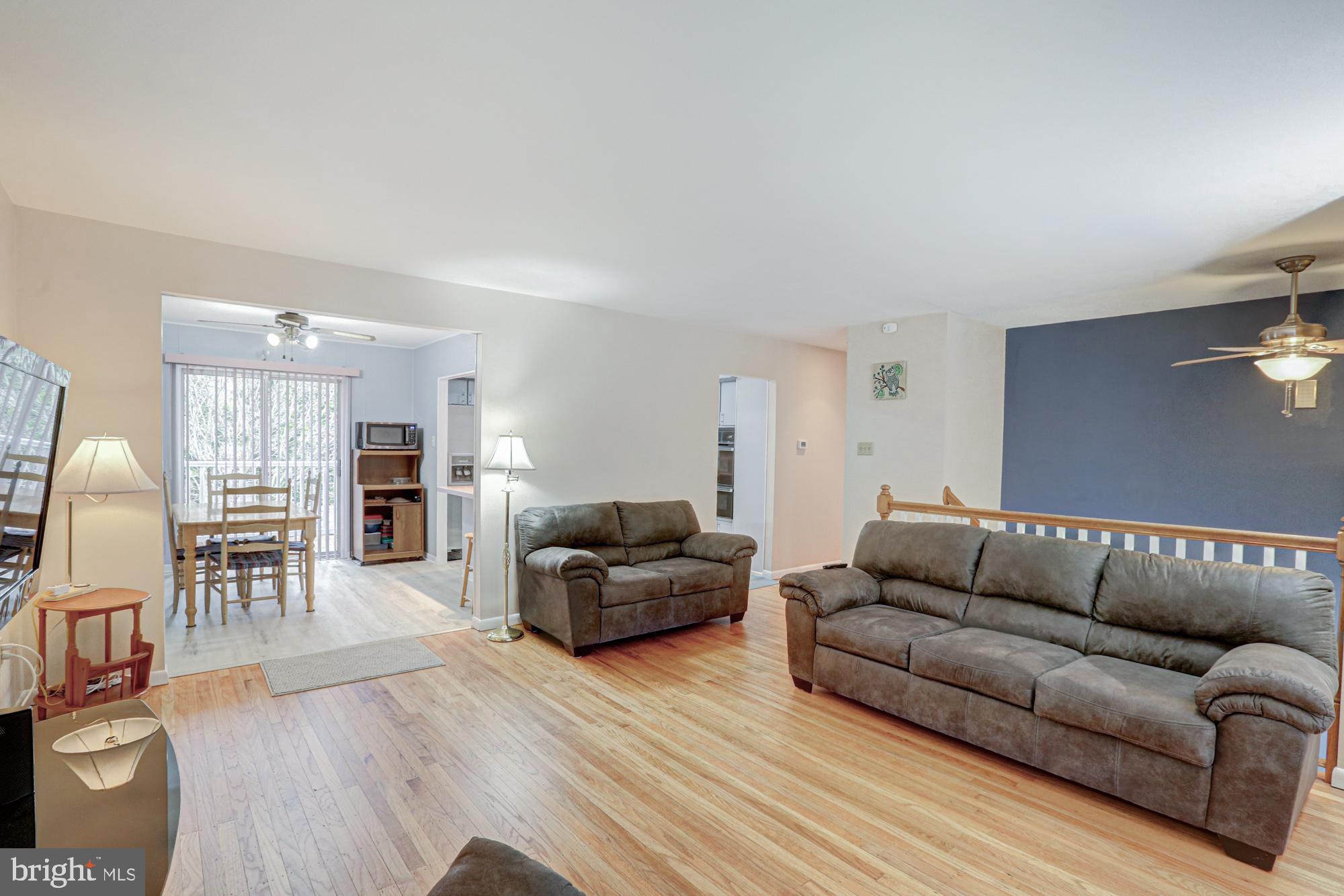 4 Old Forge Road Pennsville, NJ 08070 - Photo 33 of 61 a living room with furniture and wooden floor