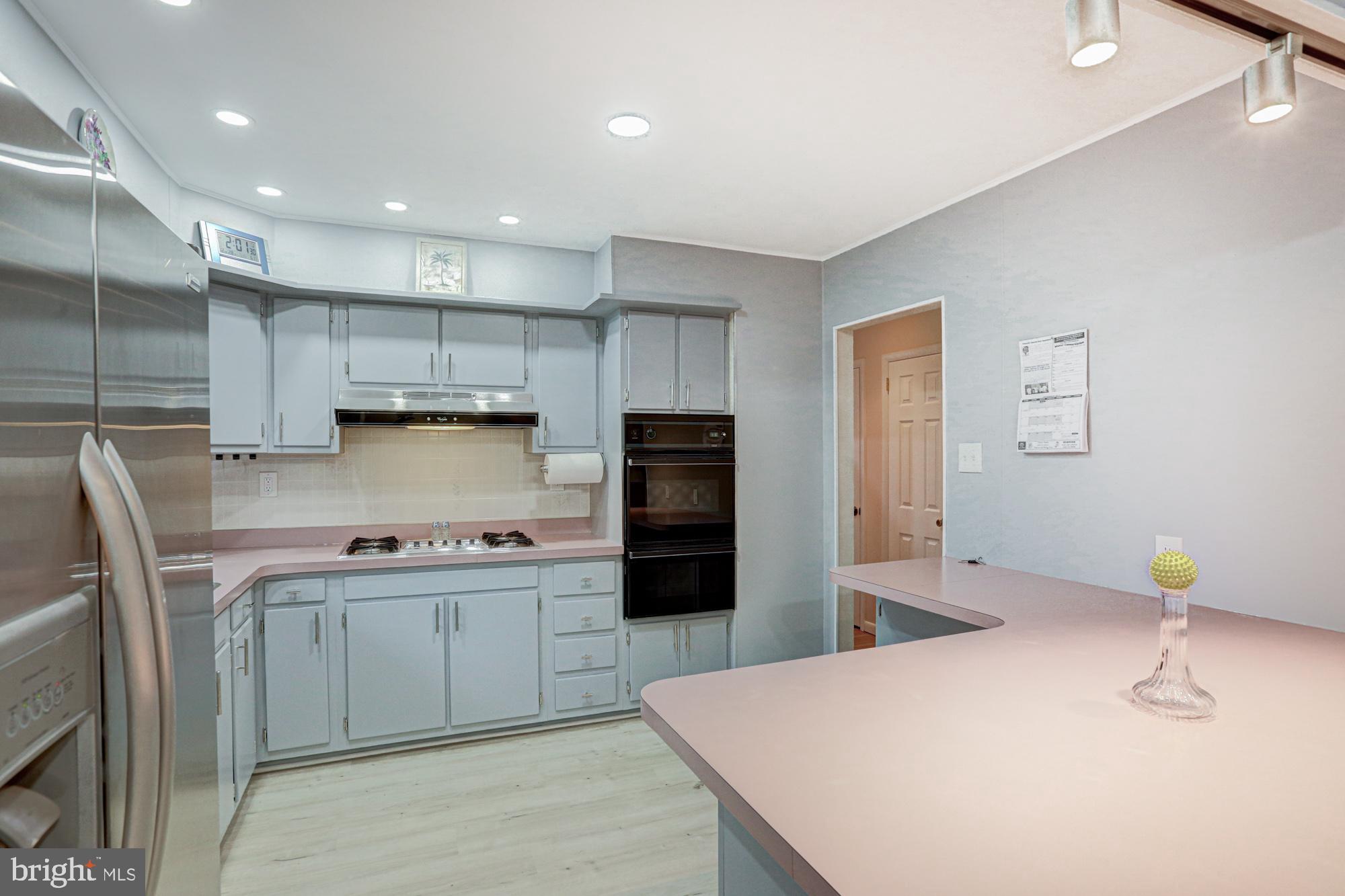 4 Old Forge Road Pennsville, NJ 08070 - Photo 36 of 61 a kitchen with stainless steel appliances a sink stove and refrigerator