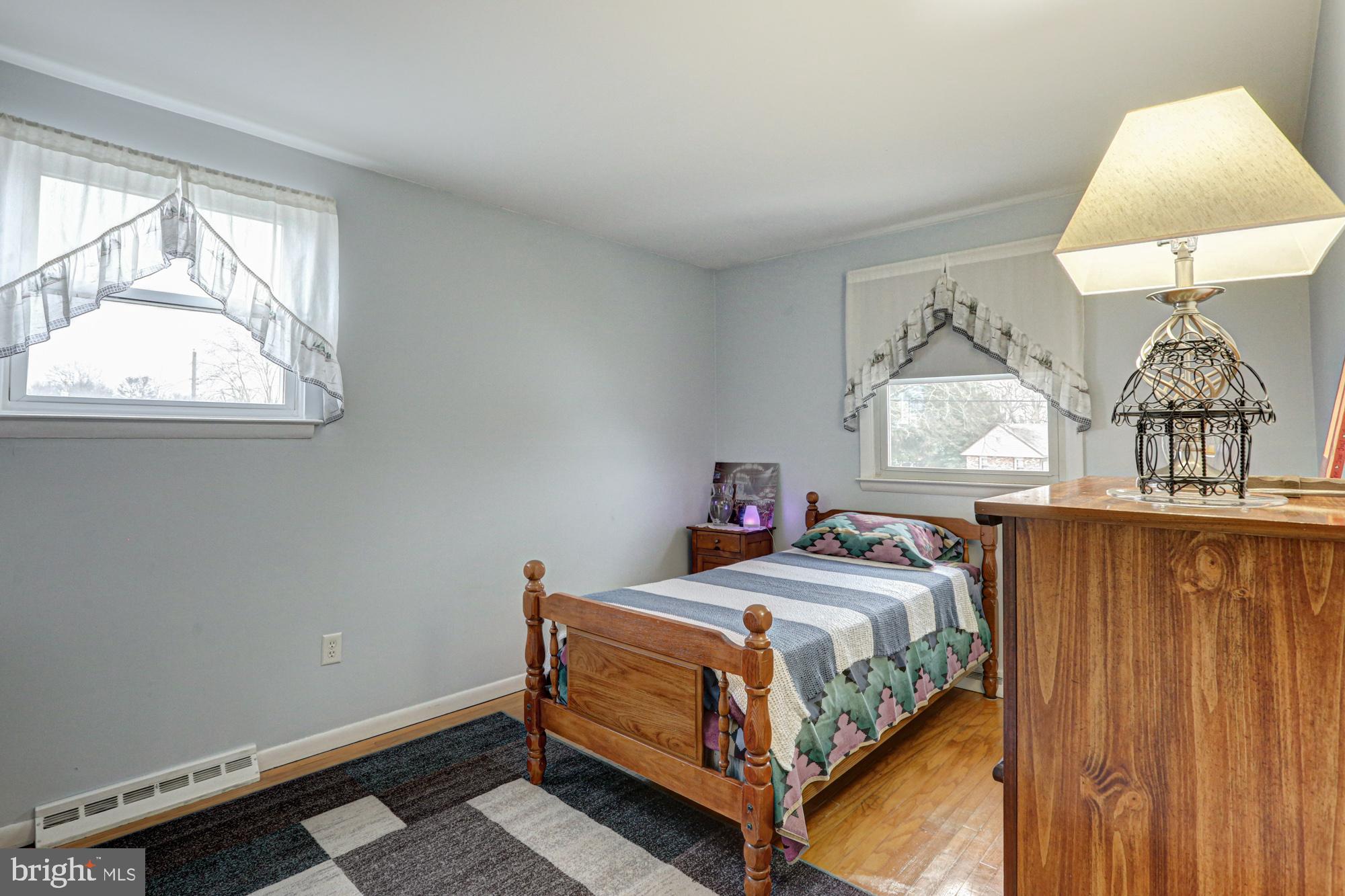 4 Old Forge Road Pennsville, NJ 08070 - Photo 43 of 61 a bedroom with a bed table and window