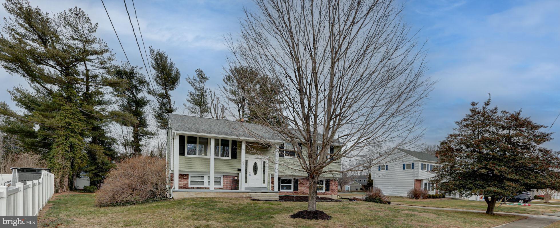 4 Old Forge Road Pennsville, NJ 08070 - Photo 61 of 61 a front view of a building with a garden